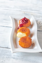 Camembert nuggets with cranberry sauce