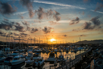Picturesque sunset over Coffs Harbour marina and town