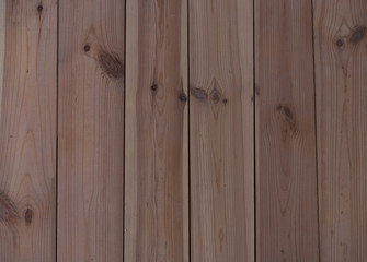 modern eco-friendly building materials - background from pine floor boards tinted with oil