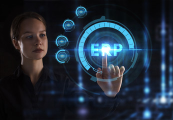 The concept of business, technology, the Internet and the network. A young entrepreneur working on a virtual screen of the future and sees the inscription: ERP