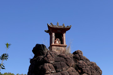 Buddhist temple along the slopes of Shibao Mountain, Yunnan, China