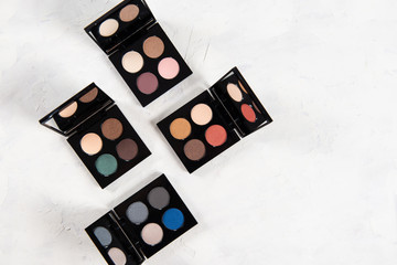 Eye shadow palettes on grey background. Professional Make up and Beauty. Beautiful Make-up concept....