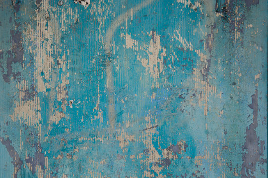 Abstract grunge blue, navy background texture. Peleed old paint, cracked blue wall © Inga