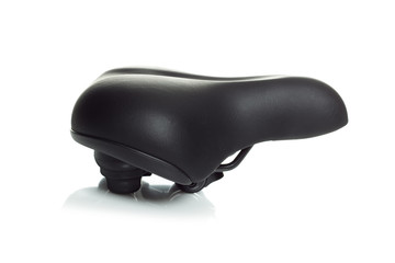 Black leather bicycle saddle isolated on white background. Side view.
