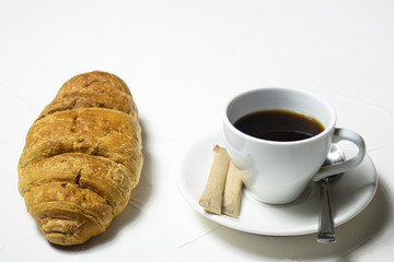 Breakfast with croissant, coffee