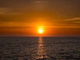 Sunset over Surin Beach in Phuket, Thailand