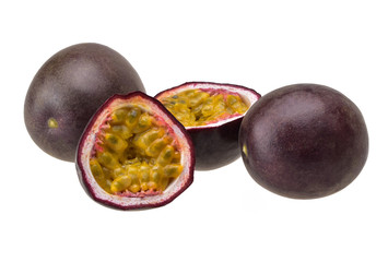 Two purple passion fruit and two halves with ripe yellow flesh on a neutral white background.