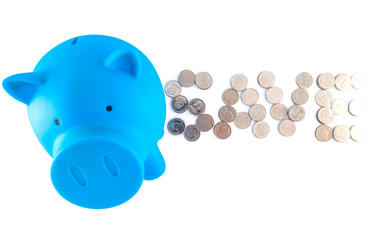 "Save" word that arranged by coins and piggy bank