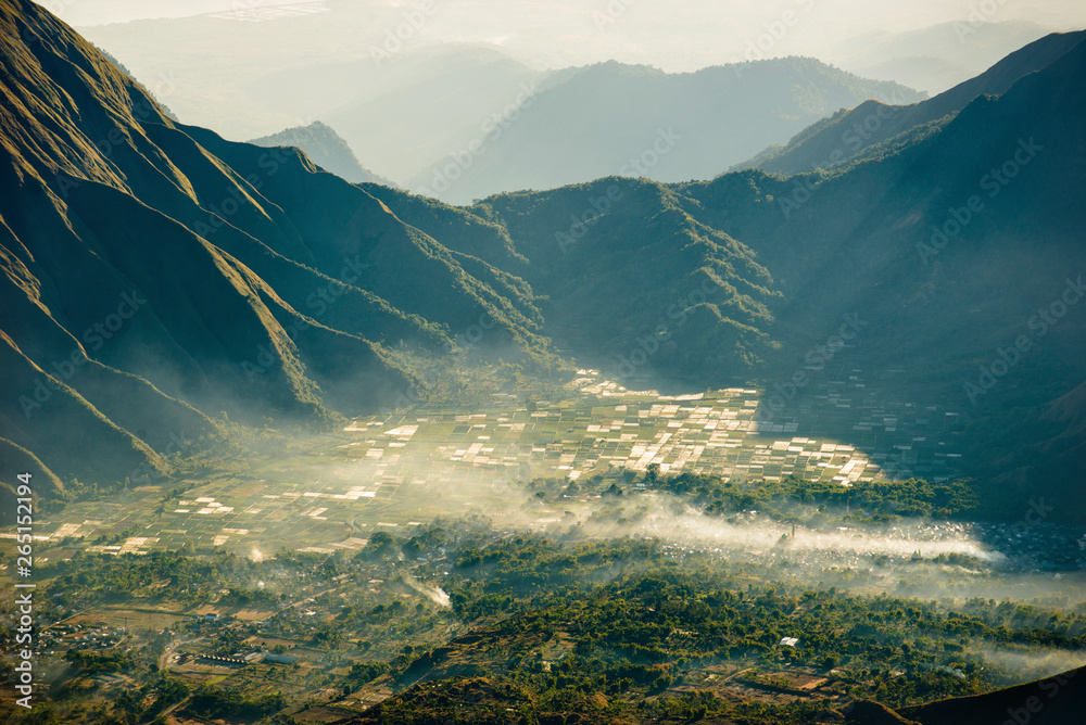 Wall mural farmland scenery at sembalun near rinjani volcano in lombok, indonesia.