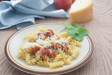Rotini Pasta. With tomato and cheese