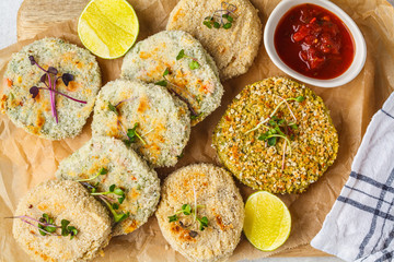 Vegan cutlets (burgers) of lentils, chickpeas and beans, top view. Healthy vegan food concept, detox dish, plant based diet.