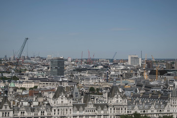 Doll image of cityscape of London from the London Eye with cranes and constructions all over, probably the reconstruction of the city approved by the council.