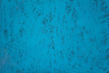 blue fiberboard closeup. rough surface texture