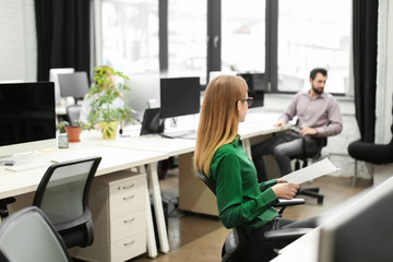 Young people working in modern office