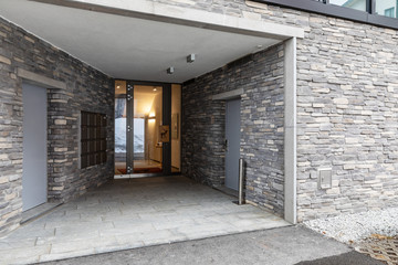 Modern entry of mountain chalets