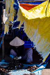 A Vietnam woman wearing a bamboo cap in the village