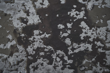 Wet black granite surface background
