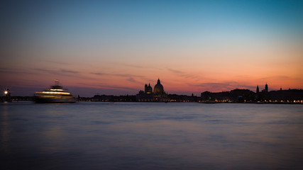 Night panorama in Venezia and ship transportation