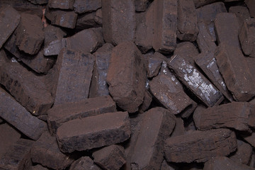 Heap of peat briquettes, alternative fuels, raw material 
