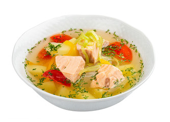 Soup with salmon and vegetables. On white background