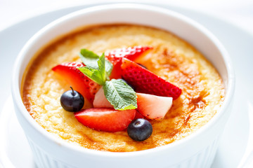Baked cottage cheese dessert with strawberry on white background