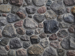 Natural stone masonry, wall made on rock stone