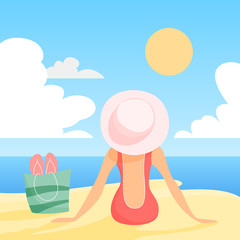 Woman in swimmng suit and hat sitting on the summer beach
