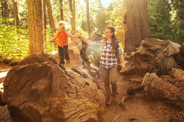 Mother with toddler visit Yosemite national park in California, USA