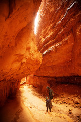 Mother with son are hiking in Bryce canyon National Park, Utah, USA