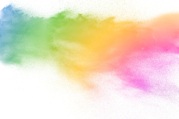 Abstract multicolored powder explosion on white background.Colorful dust explode. Painted Holi...