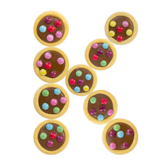 colorful cookies glaze, letter K, alphabet, white background isolated