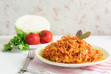 Homemade cabbage stew made from: cabbage, onion, carrot, celery and tomatoes.