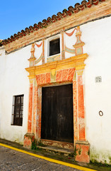 Fototapeta premium Manor house in Castaño del Robledo beautiful village of the Sierra de Aracena Natural Park. Province of Huelva Andalusia Spain