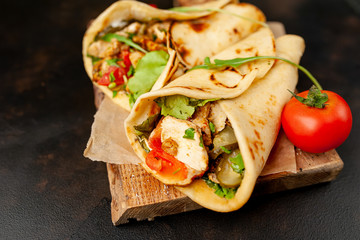 delicious mexican tacos with salad on concrete background. mexican cuisine