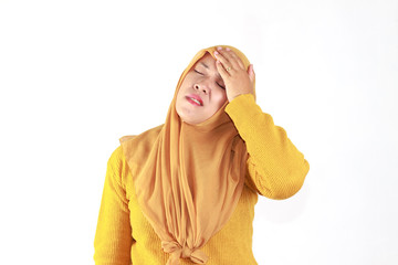 head ache face expression of Muslim asian woman wearing hijab isolated over white background