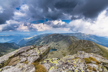 Beautiful cloudy landscape in the Alps, in summer