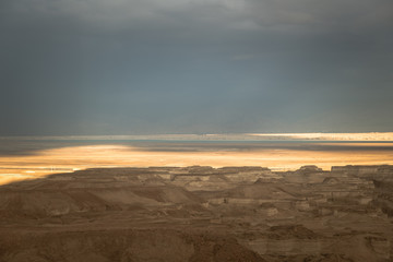 dark clouds over the dead sea