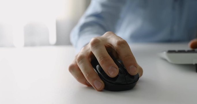 working with desktop computer in office. 4k dolly shot