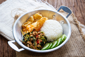 Original fried basil with pork served with jasmine rice and fried egg.