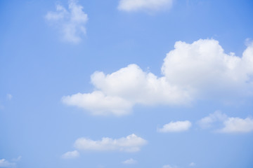 Naklejka na ściany i meble Beautiful background of a clouds in the blue sky close up.