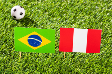 Fototapeta premium Flag of Brazil and Peru at the football stadium - Copa América football tournament conmebol Brazil