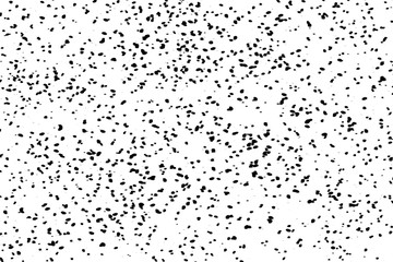 Drops of black paint splattered on a white background, texture