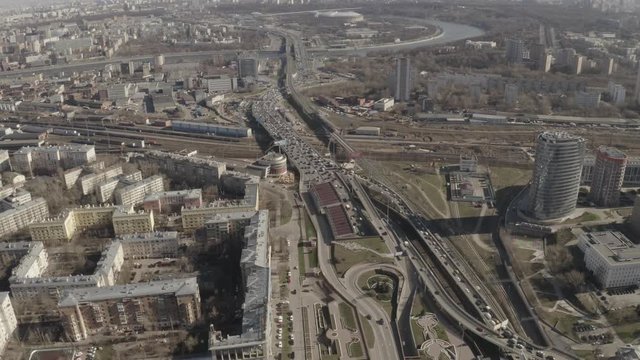Aerial footage of motorway with driving cars near Moscow city, Luzhniki. Russia.