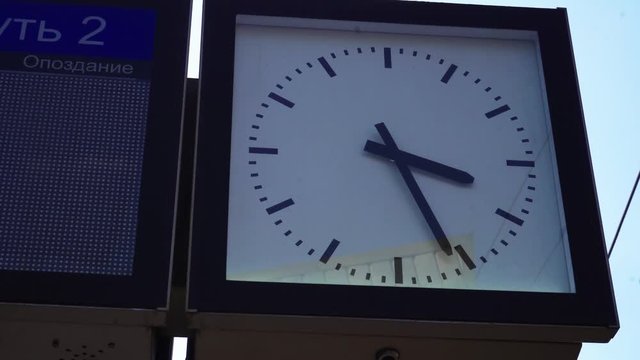 Railway station clock and information board. Moscow