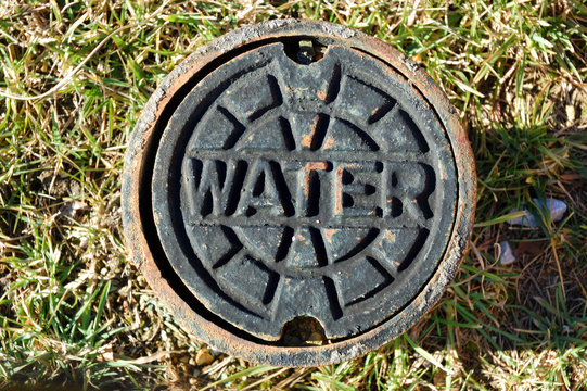 A water meter and valve cover