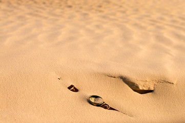 watches are covered with sand