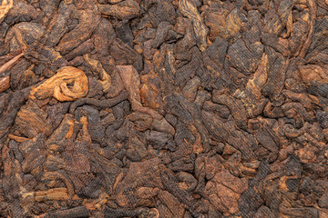 Chinese Tea Shu Puer Menhay. Macro. Close-up. Pressed Tea. Texture.