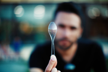 Plastic spoon, ecology concept, close up