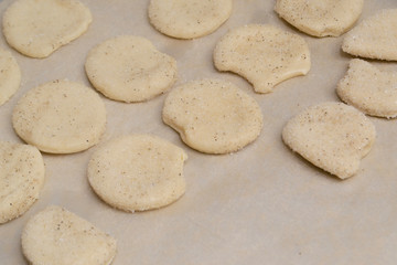 Sweet homemade cookies on a baking sheet before baking