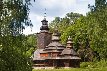 old Ukrainian Orthodox church, wooden building in traditional Galicia style on a beautiful spring day